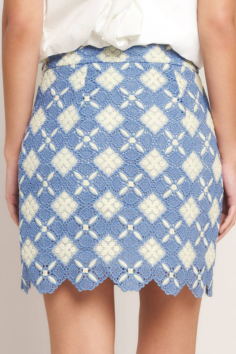 Blue woven lace mini skirt from voglio.us featuring intricate lace detailing and a fitted, stylish design.