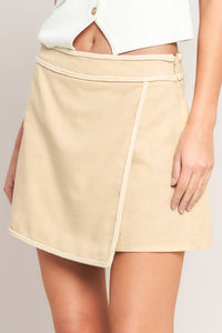 Voglio.us Chic Minimal Wrap Skort in neutral fabric, featuring a stylish wrap design and tailored fit on a mannequin.