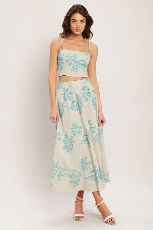 Voglio.us floral linen blend skirt with a flowy design and vibrant floral pattern, perfect for spring and summer wear.