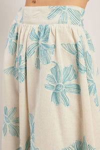 Floral linen blend skirt by voglio.us featuring a flowy design and vibrant floral pattern, perfect for casual or summer wear.