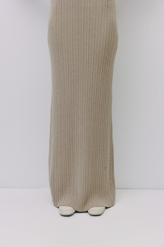 Ribbed knit maxi skirt by voglio.us featuring a fitted waist and flowing length, in a soft, textured fabric.