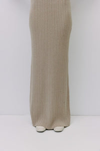 Ribbed knit maxi skirt by voglio.us featuring a fitted waist and flowing length, in a soft, textured fabric.