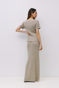 Ribbed knit maxi skirt by voglio.us featuring a fitted waistband and flowing length in soft, textured fabric.