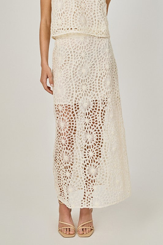 Textured midi skirt by voglio.us featuring a stylish, flowy design with detailed fabric texture and a flattering fit.
