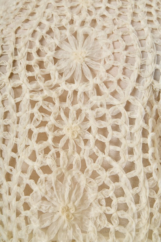 Textured midi skirt from voglio.us with a flowy design and detailed fabric, shown in a stylish, natural pose.