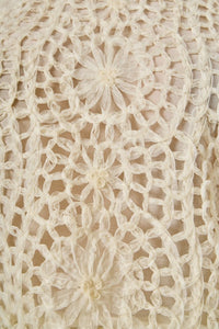 Textured midi skirt from voglio.us with a flowy design and detailed fabric, shown in a stylish, natural pose.