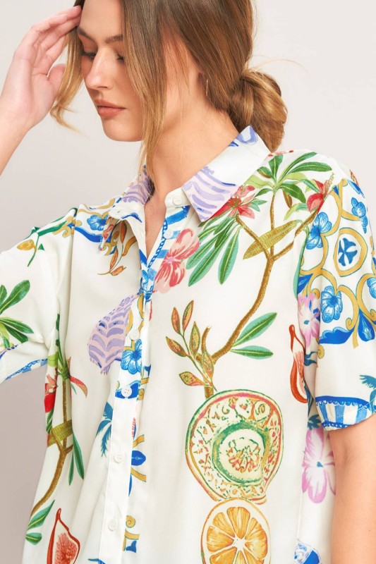 Chic floral and coastal short sleeve top from voglio.us, featuring vibrant floral patterns and lightweight fabric.