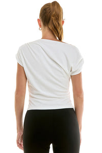 Small draped knit top by voglio.us featuring a relaxed fit, soft fabric, and stylish design, perfect for casual wear.
