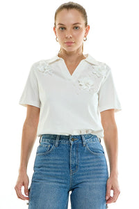 Voglio.us floral appliqué polo top featuring colorful embroidered flowers on a classic polo shirt for women.