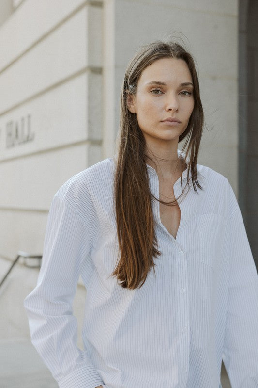 Oversized pinstripe button-down shirt from voglio.us, featuring a classic collar, long sleeves, and a relaxed fit for casual style.
