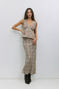 Voglio.us Paxton sleeveless blouse with lace trim, light fabric, and elegant design, shown on a hanger.