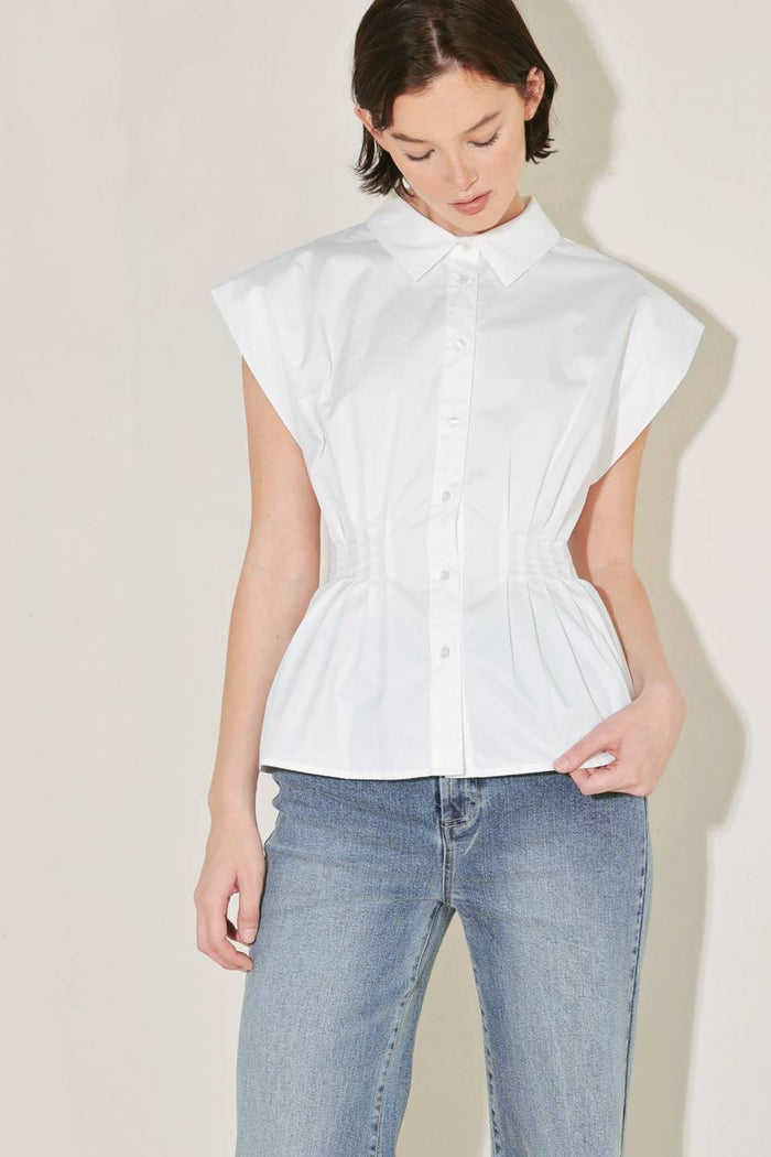 Voglio.us peplum top with corset waist, stylish women’s fashion top featuring fitted design and ruffled peplum hem.