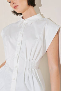 Voglio.us peplum top with corset waist, stylish women's top featuring a fitted silhouette and ruffled hem detail.