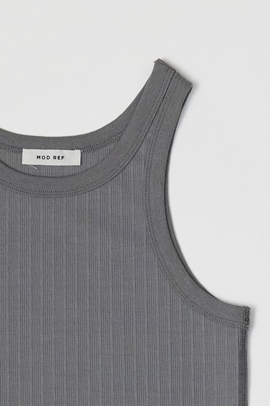 Ribbed fitted tank top from voglio.us in two color options, featuring a close-up of the textured fabric and sleeveless design.