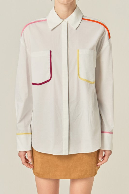 Flat binding detailed shirt top by voglio.us, featuring intricate design and tailored fit, shown on a mannequin.