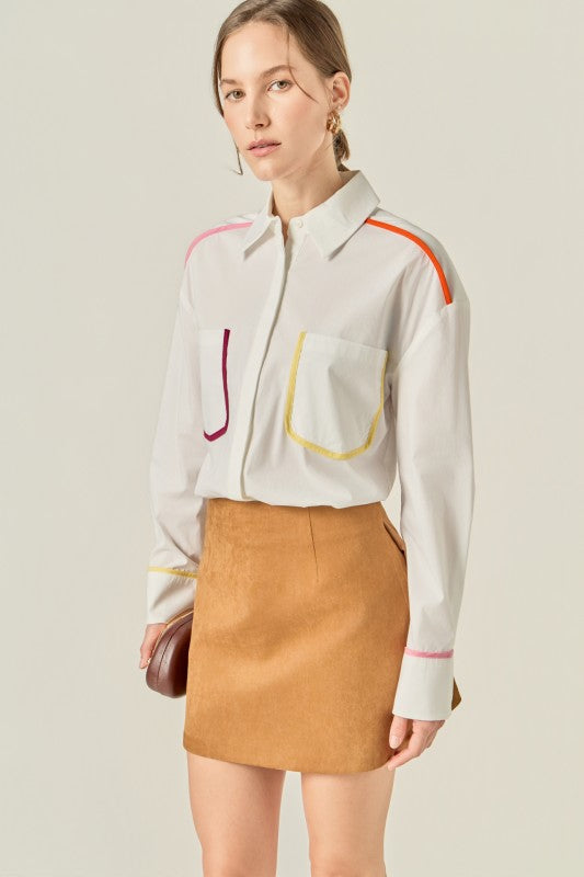 Flat binding detailed shirt top by voglio.us featuring a stylish design and tailored fit, shown on a neutral background.