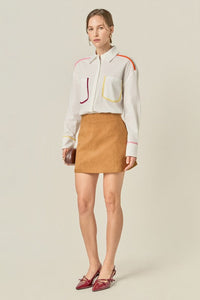 Flat binding detailed shirt top by voglio.us, featuring intricate design and tailored fit, displayed on a mannequin.