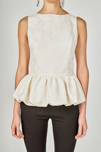 Voglio.us jacquard sleeveless peplum top in intricate patterned fabric, stylish and fitted for a modern look.