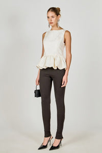 Voglio.us jacquard sleeveless peplum top in intricate fabric with a fitted bodice and flared peplum hem, shown on a model.
