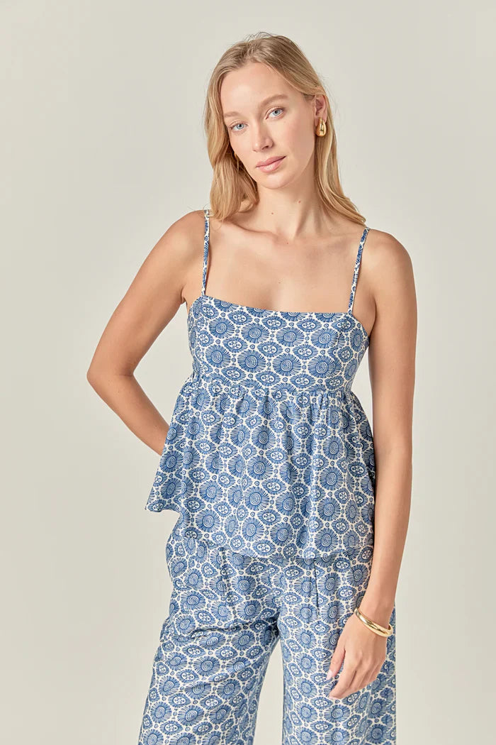 Printed baby doll top from voglio.us featuring a colorful, lightweight design with short sleeves and a relaxed fit.