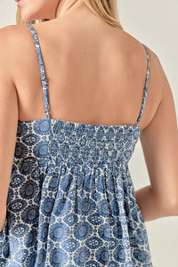 Printed baby doll top by voglio.us, featuring a colorful, stylish design with a comfortable fit and short sleeves.