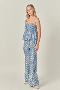 Printed baby doll top by voglio.us featuring colorful floral patterns and a relaxed fit, perfect for casual wear.