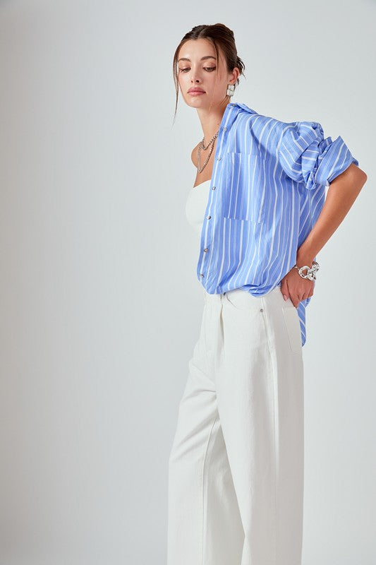 Striped oversized shirt top by voglio.us featuring bold horizontal stripes and a relaxed fit, displayed on a hanger.