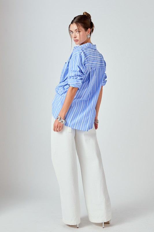 Striped oversized shirt top by voglio.us featuring a relaxed fit and bold horizontal stripe pattern, shown on a model.
