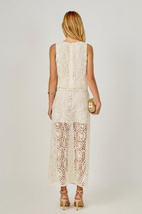 Textured sleeveless cropped top by voglio.us, showing close-up fabric details and stylish fit on a model.