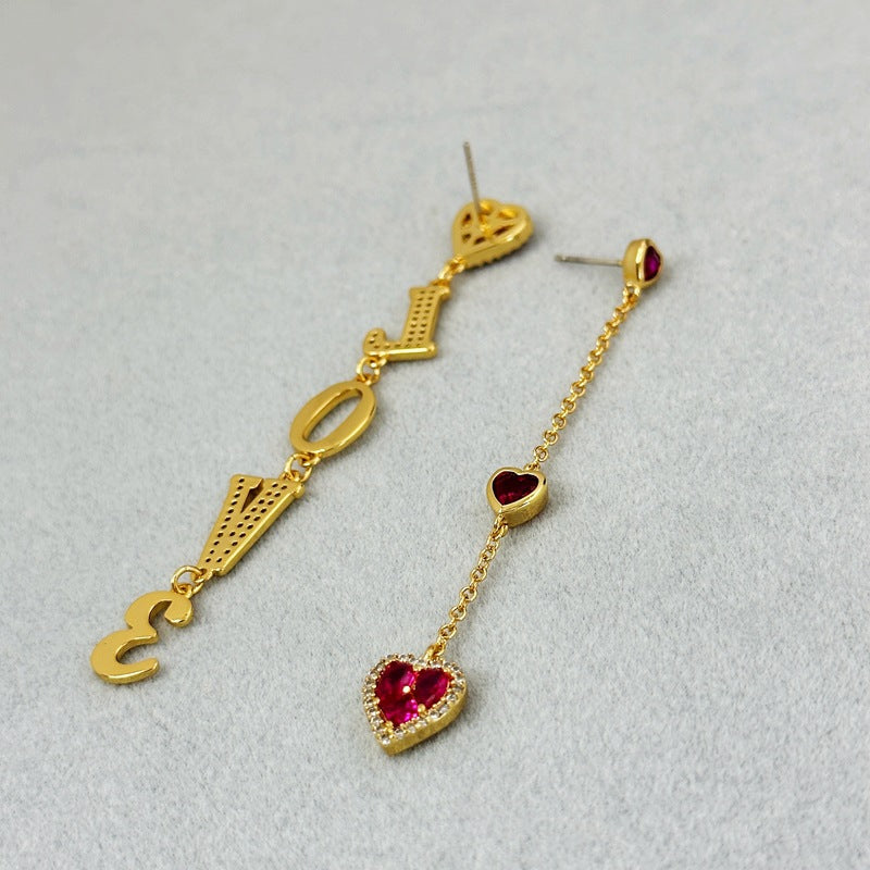 Wanita Store gold asymmetric love zircon earrings with romantic aura, high-grade design, perfect for special interest fashion jewelry.
