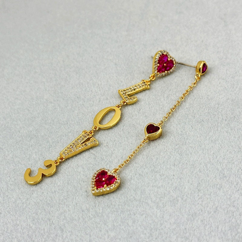 Wanita Store gold asymmetric love zircon earrings with romantic aura and high-grade design, featuring a unique special interest style.
