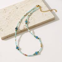 Blue natural stone beaded necklace for women featuring a court star design, elegant and lightweight jewelry from Wanita Store.