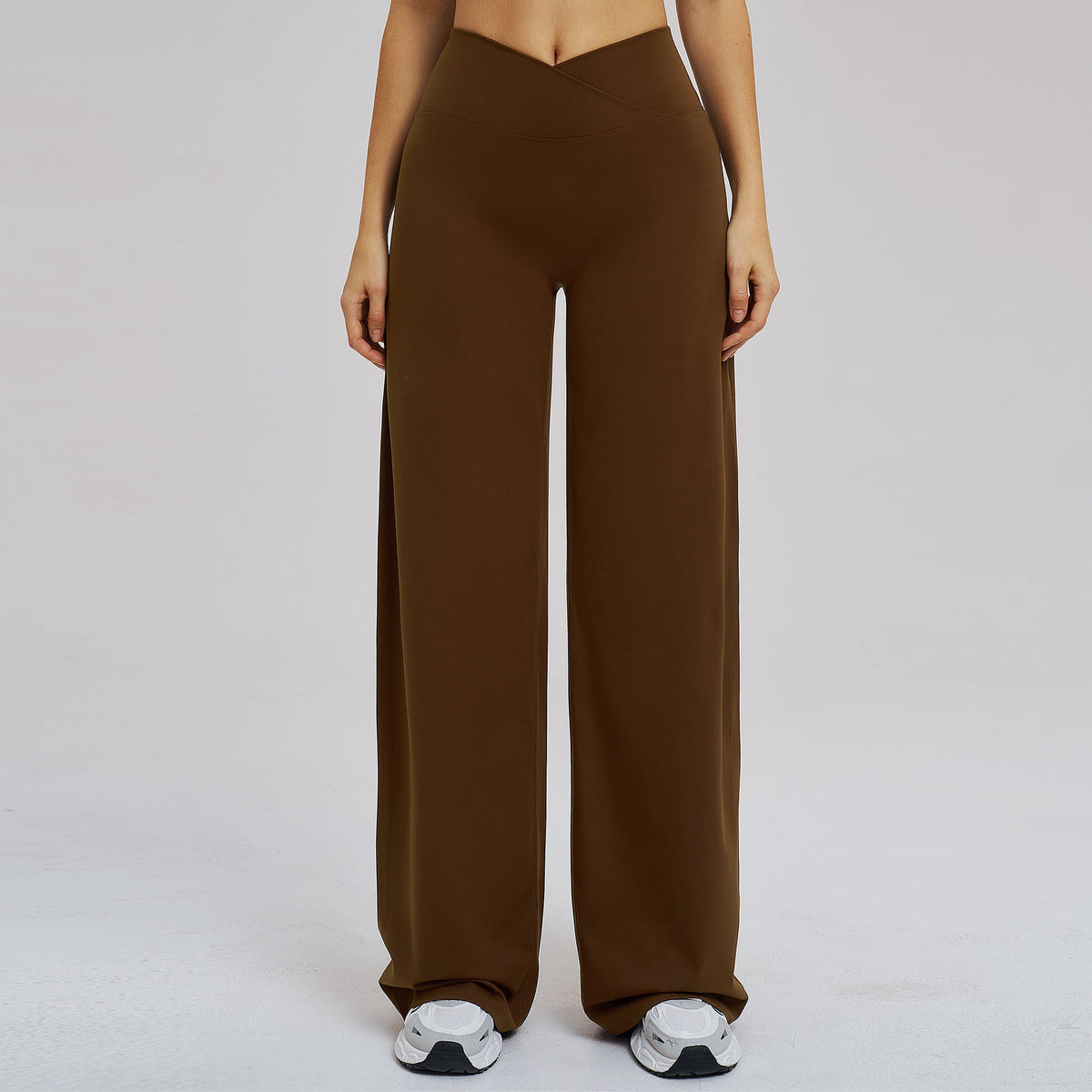 Black brushed wide-leg casual pants from Wanita Store with cross waist design, ideal for outdoor running and sports.