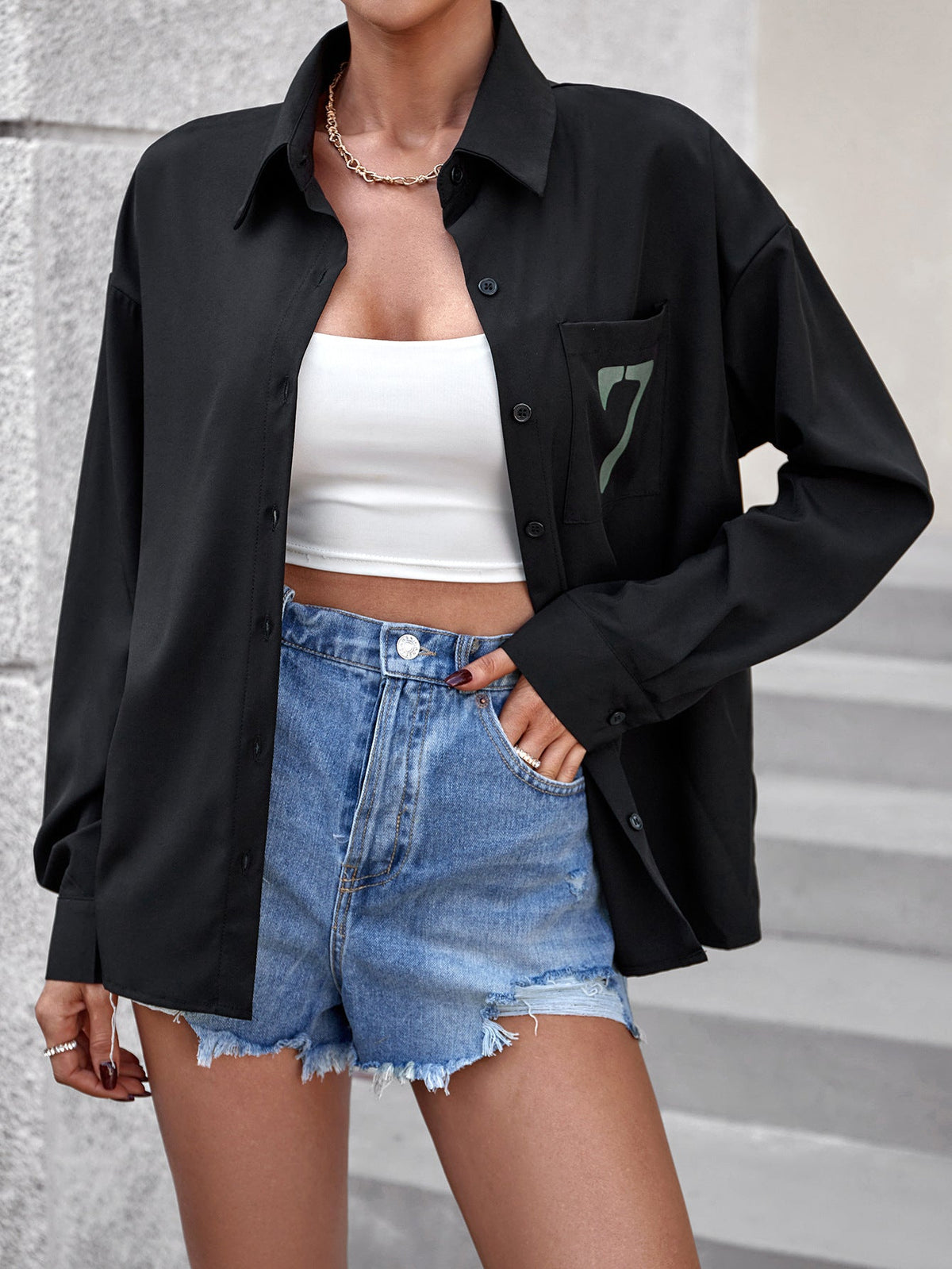 Black women's long sleeve office shirt from Wanita Store, stylish and professional for women's office wear.