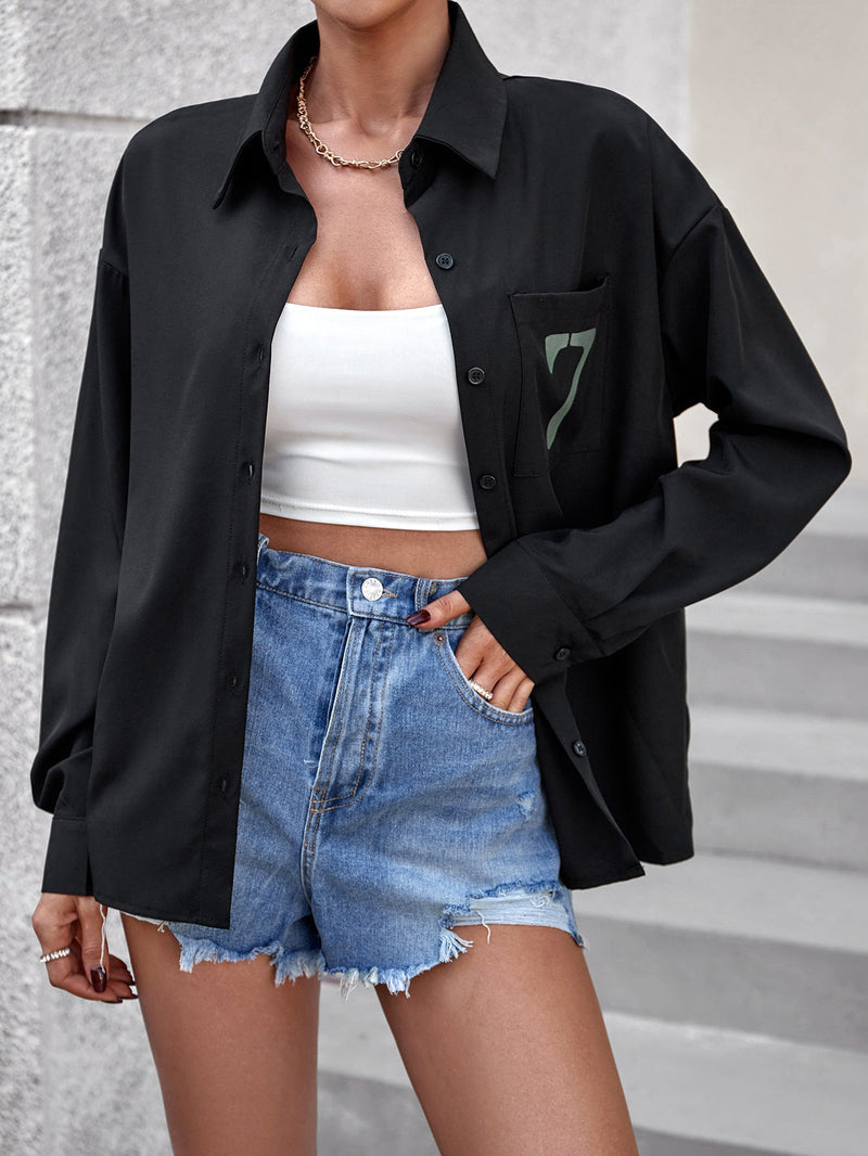 Black women's long sleeve office shirt from Wanita Store, stylish and professional for women's office wear.