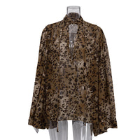 Brown leopard print long-sleeve women’s shirt with stand-up collar and hollow-out cutout, stylish spring top by Wanita Store