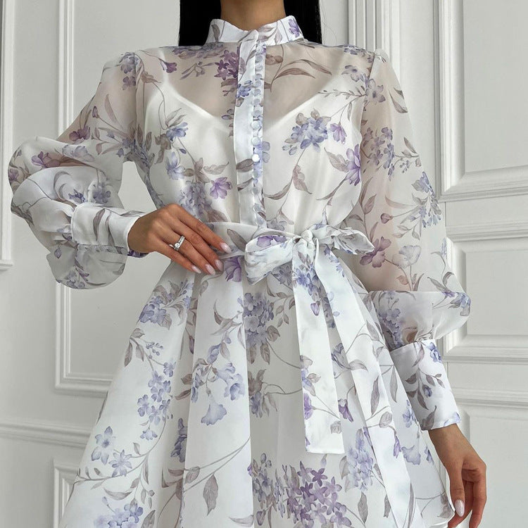 White women’s elegant A-line cami dress with long sleeves, stand collar, lace print, by Wanita Store.