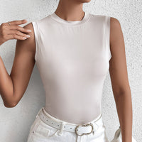 Black Wanita Store summer sleeveless milk silk vest with a round neck, slim fit, and refined outdoor design.