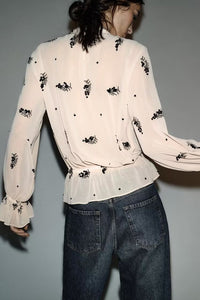 Winter fashionable sequin translucent shirt by Wanita Store, featuring a versatile, stylish design with shimmering sequins.