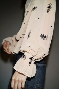 Winter fashionable sequin translucent shirt by Wanita Store, featuring a stylish, versatile design with shimmering sequins.