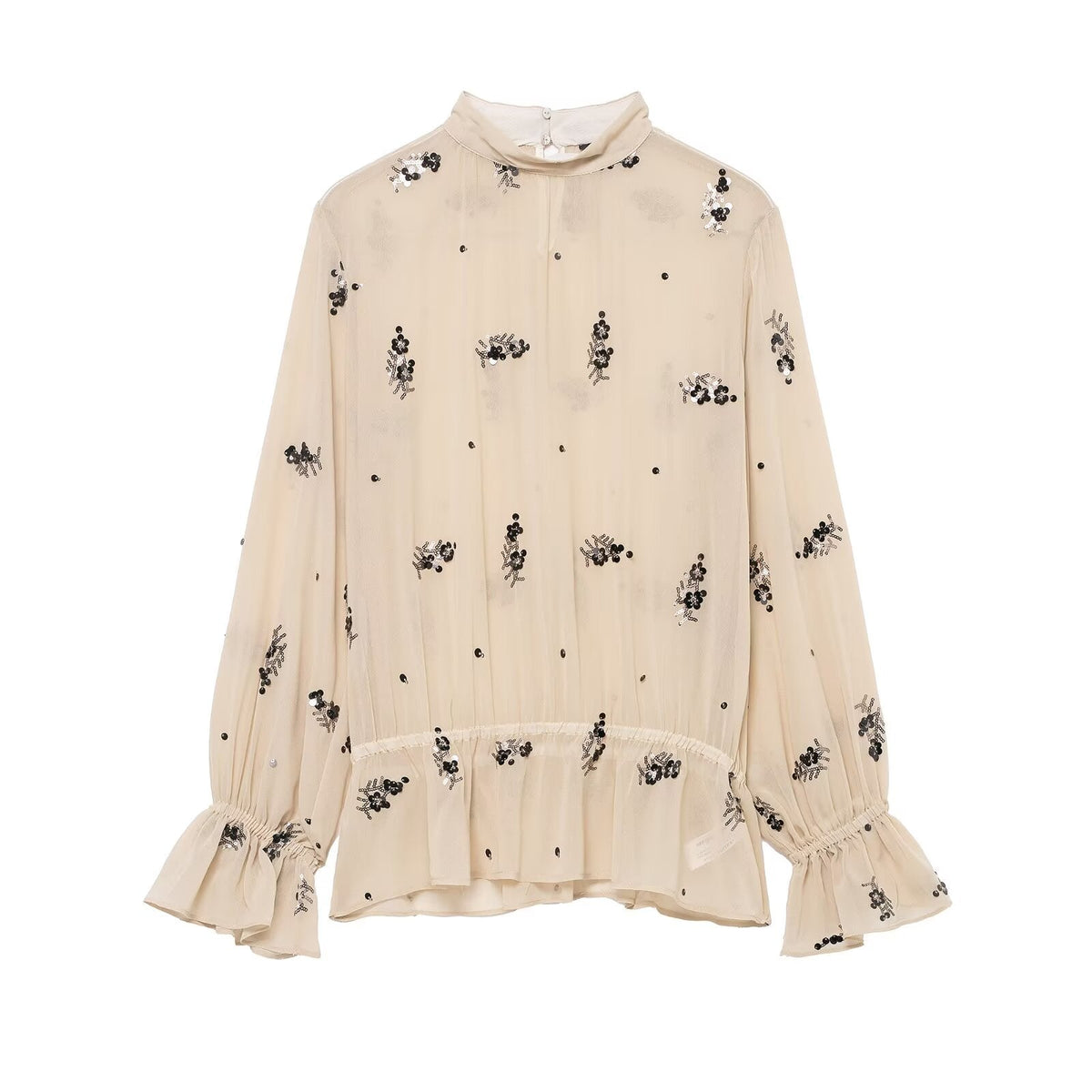 Winter fashionable sequin translucent shirt by Wanita Store featuring a shiny, all-match design for stylish winter wear.