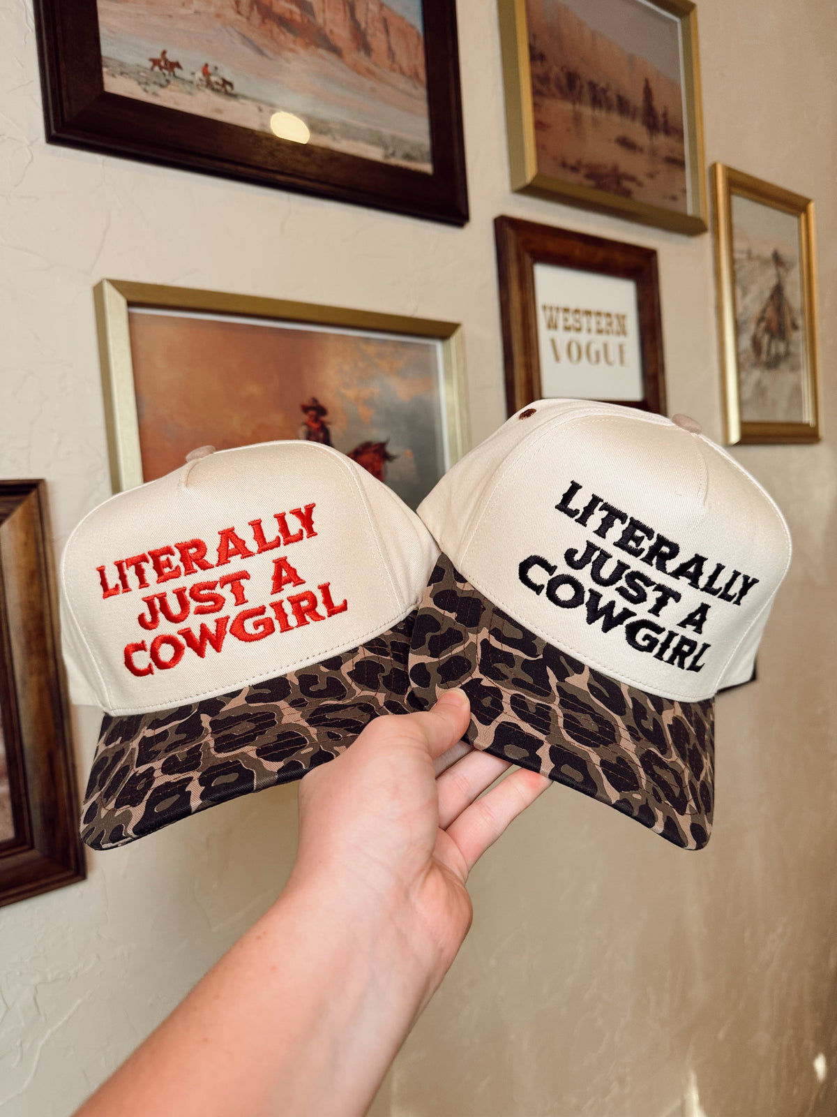 Black "Just a Cowgirl" baseball cap by Western Vogue Boutique, casual western-style adornment with adjustable strap.