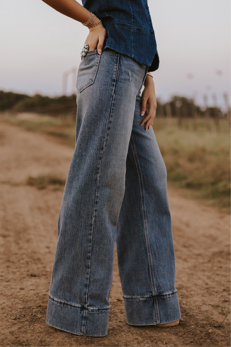 Medium wash Cambree women’s jeans by Western Vogue Boutique, featuring classic fit and five-pocket style.