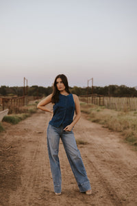 Medium wash Cambree women’s jeans by Western Vogue Boutique, showcasing classic denim style and fit.