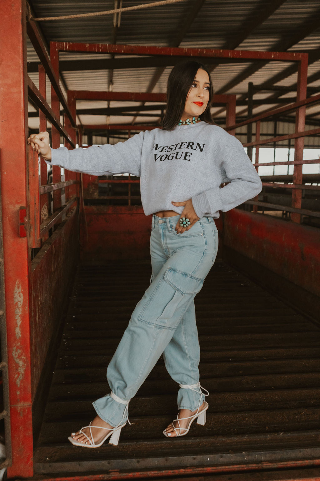 Women’s Denton Denim Cargo Jeans by Western Vogue Boutique, showcasing stylish blue denim with multiple cargo pockets.