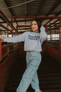 Women’s blue denim cargo jeans from The Denton collection by Western Vogue Boutique, featuring a relaxed fit and multiple pockets.