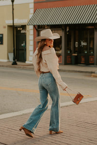 Western Vogue Boutique Happi Jeans 31, stylish denim bottoms with a classic fit, shown on a model.