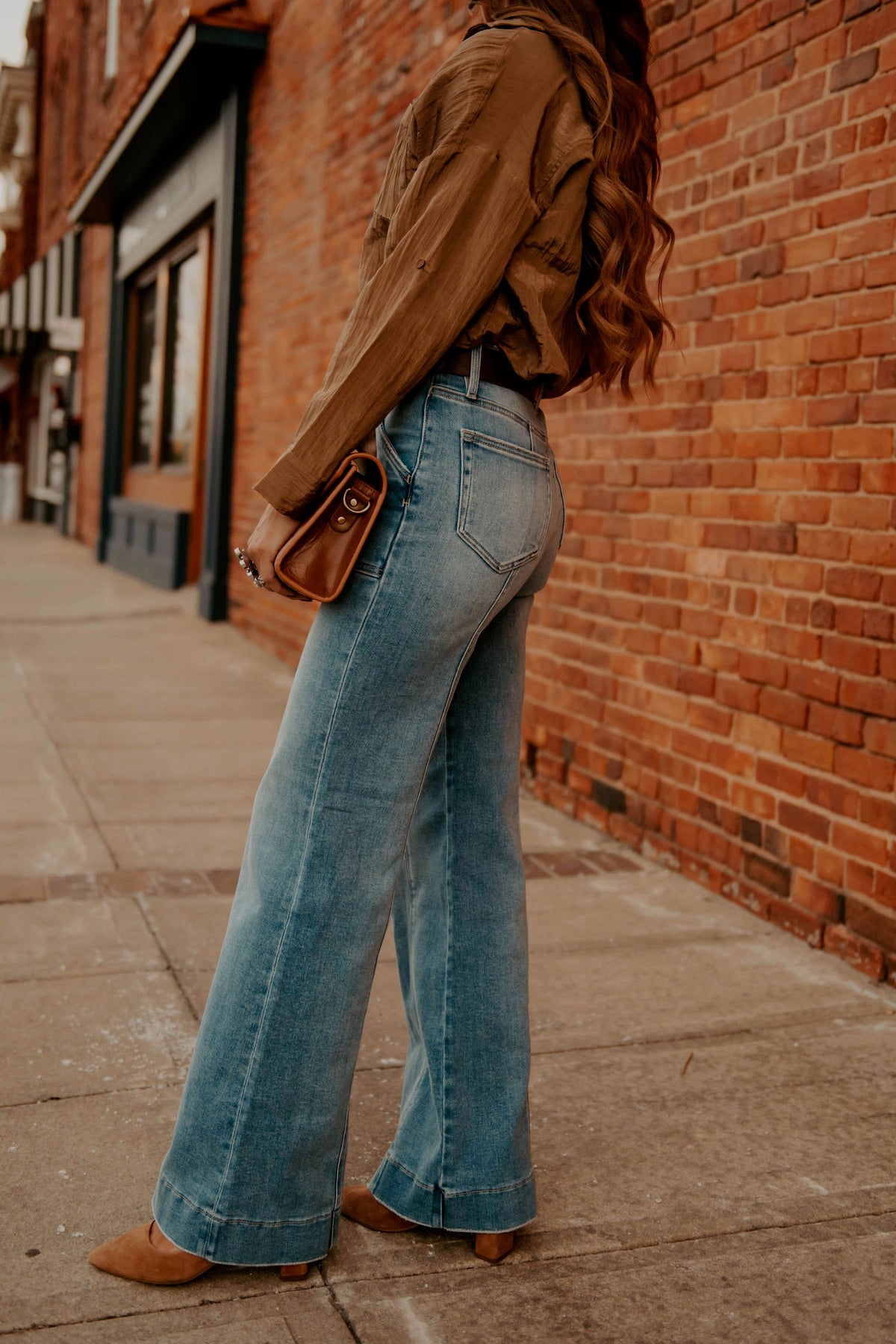 Western Vogue Boutique Happi Jeans 31 in stylish denim, shown as casual bottoms with a relaxed fit and classic jean design.