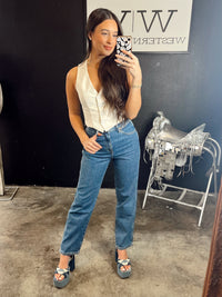 Women’s Wrangler jeans from Western Vogue Boutique, casual denim bottoms with classic five-pocket design and belt loops.