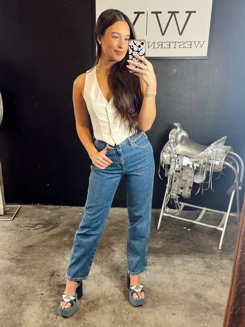 Women’s Wrangler jeans from Western Vogue Boutique, casual denim bottoms with classic five-pocket design and belt loops.